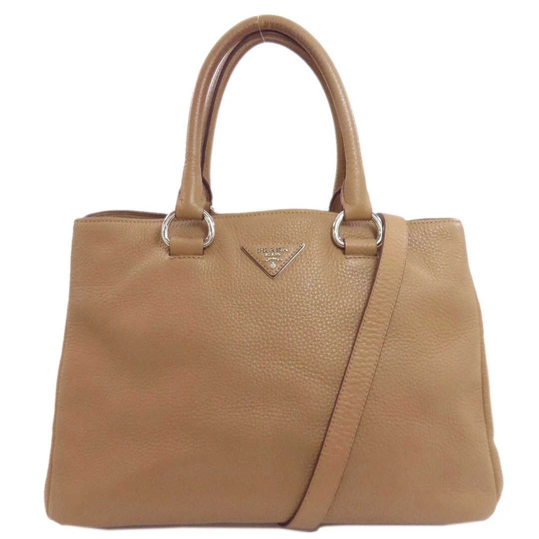 PRADA LEATHER 2WAY HANDBAG BROWN: PRADA Leather 2WAY Handbag Brown Brand: PRADA Type/Style: Bag Material: Leather Color: Brown Size: Approximately 24 cm (9.4 in) (height), 33-34 cm (13-13.4 in) (width), 18 cm (7.1 in) (depth) Acce