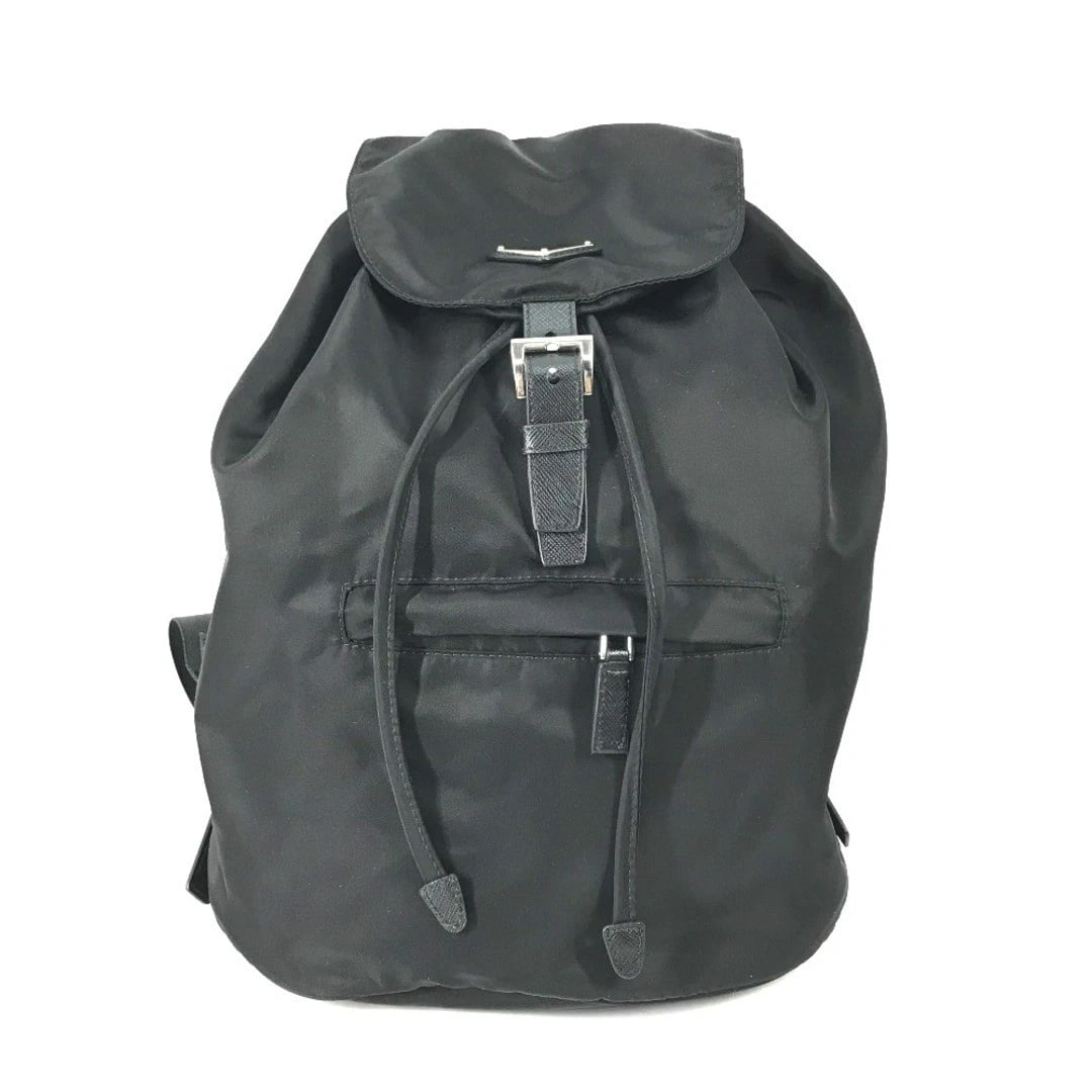 PRADA TRIANGULAR LOGO BACKPACK BLACK: PRADA Triangular Logo Backpack Black Brand: PRADA Type/Style: Backpack Material: Nylon / Leather Color: Black Size: Approximately 26.5 cm (10.4 in) W x 34.5 cm (13.6 in) H x 14.5 cm (5.7 in) D Acc