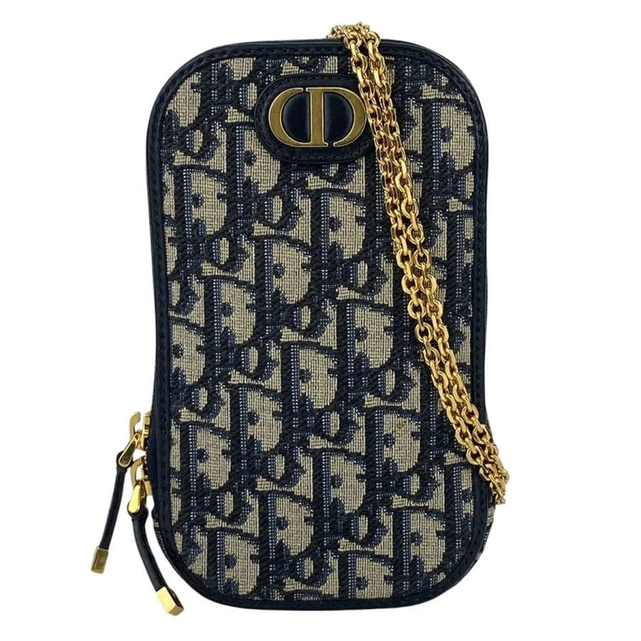 CHRISTIAN DIOR CALL'IN DIOR PHONE HOLDER CARD CASE BLUE OBLIQUE: Christian Dior Call'in Dior Phone Holder Card Case Blue Oblique Brand: Christian Dior Type/Style: Bag Material: Dior Oblique Jacquard Fabric Color: Blue Size: W 10.5 cm (4.13 in) x H 18.5 cm (7.28
