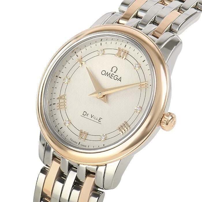 OMEGA DE VILLE PRESTIGE QUARTZ WATCH: Omega De Ville Prestige Quartz Watch Brand: OMEGA Type/Style: Wristwatch Material: Stainless Steel, Red Gold Color: Dial Color silver Size: Case Size: 27mm Accessories: None Accessories Notice: When