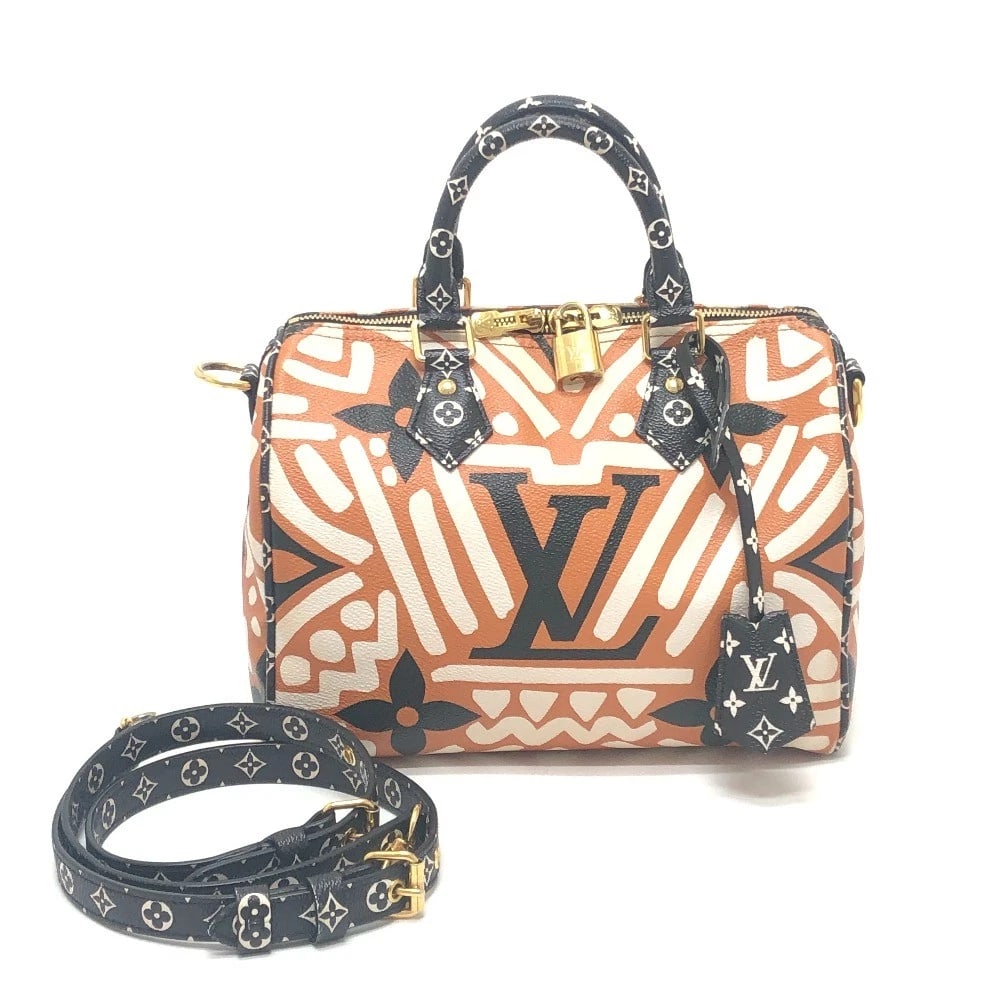 LOUIS VUITTON MONOGRAM-GIANT SPEEDY 25 LV CRAFTY HAND BAG: LOUIS VUITTON Monogram-Giant Speedy 25 LV Crafty Hand Bag Brand: Louis Vuitton Type/Style: Duffle Bag Material: Leather / PVC Color: Brown / white Size: W10.2?H7.9?D5.9inch / W26cm?H20cm?D15cm