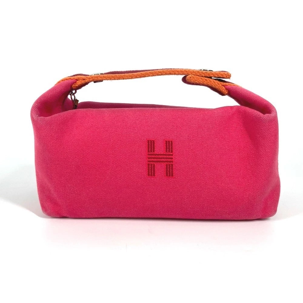 HERMES BRIDA BLACK PM POUCH BAG VANITY BAG HAND BAG: HERMES Brida Black PM Pouch bag vanity bag Hand Bag Brand: HERMES Type/Style: Hand Bag Material: Canvas Color: Pink Size: W7.9?H3.5?D4.7inch / W20cm?H9cm?D12cm Accessories: None Accessorie