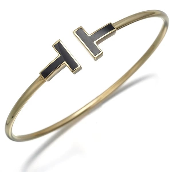 TIFFANY&CO. BRACELET ONYX 18K 750 YELLOW GOLD: Tiffany&Co. Bracelet Onyx 18K 750 Yellow Gold Brand: Tiffany & Co. Type/Style: Bracelet Material: 18K 750 Yellow Gold Color: Yellow Size: Inner circumference: 16cm Design width: 10.4mm Accessories: