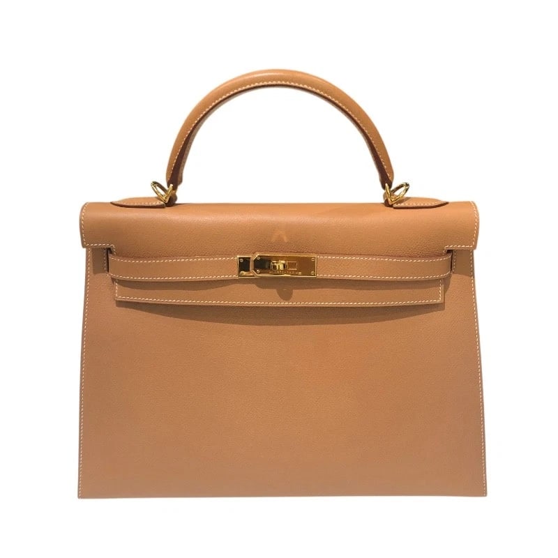 HERMES KELLY 32 OUTSIDE SEWING HANDBAG: HERMES Kelly 32 outside sewing Handbag Brand: HERMES Type/Style: Handbag Material: Courchevel Color: Natural GDHardware Size: W12.6 x H9.4x D4.7inch Accessories: None Accessories Notice: When