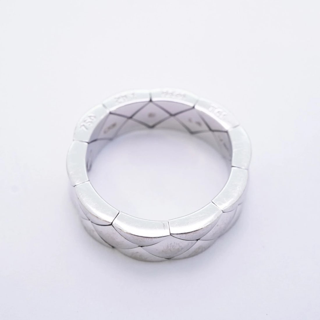 CHANEL MATELASSE RING, 18K WHITE GOLD: Chanel Matelasse Ring, 18K White Gold Brand: Chanel Type/Style: Band Ring Material: White gold (18K) Color: White gold Size: US 10 Accessories: None Accessories Notice: When purchasing pre