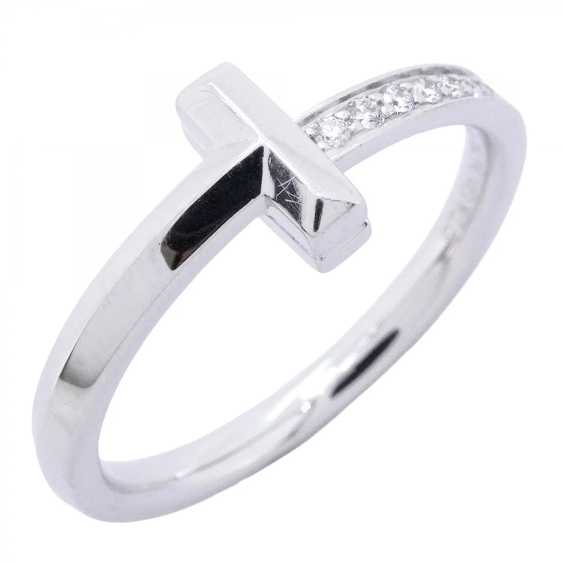 TIFFANY & CO. T ONE RING, 18K WHITE GOLD, DIAMOND: Tiffany & Co. T One Ring, 18K White Gold, Diamond Brand: Tiffany Type/Style: Band Ring Material: White gold (18K), Main Stone/Creation Natural Color: White gold Size: US 7.5 Accessories: None