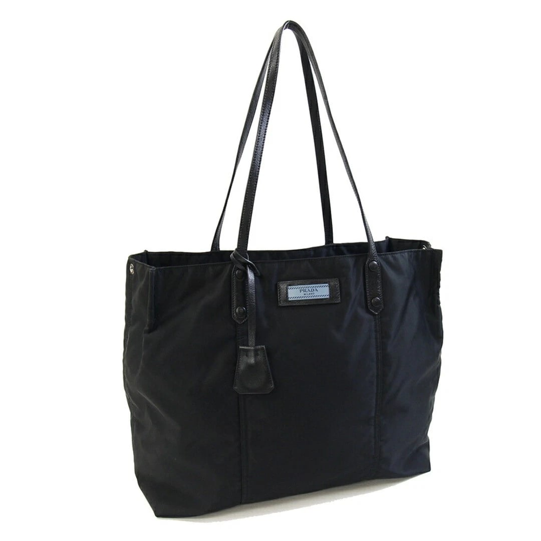 PRADA ETIQUETTE TOTE BAG LEATHER NYLON: Prada Etiquette Tote Bag Leather Nylon Brand: PRADA Type/Style: Bag Material: Nylon and Leather (TESSUTO + GLA?E) Color: Black (NERO) Size: Approximately W38-44 cm (15.0-17.3 in) x H32.5 cm (12.8 in)