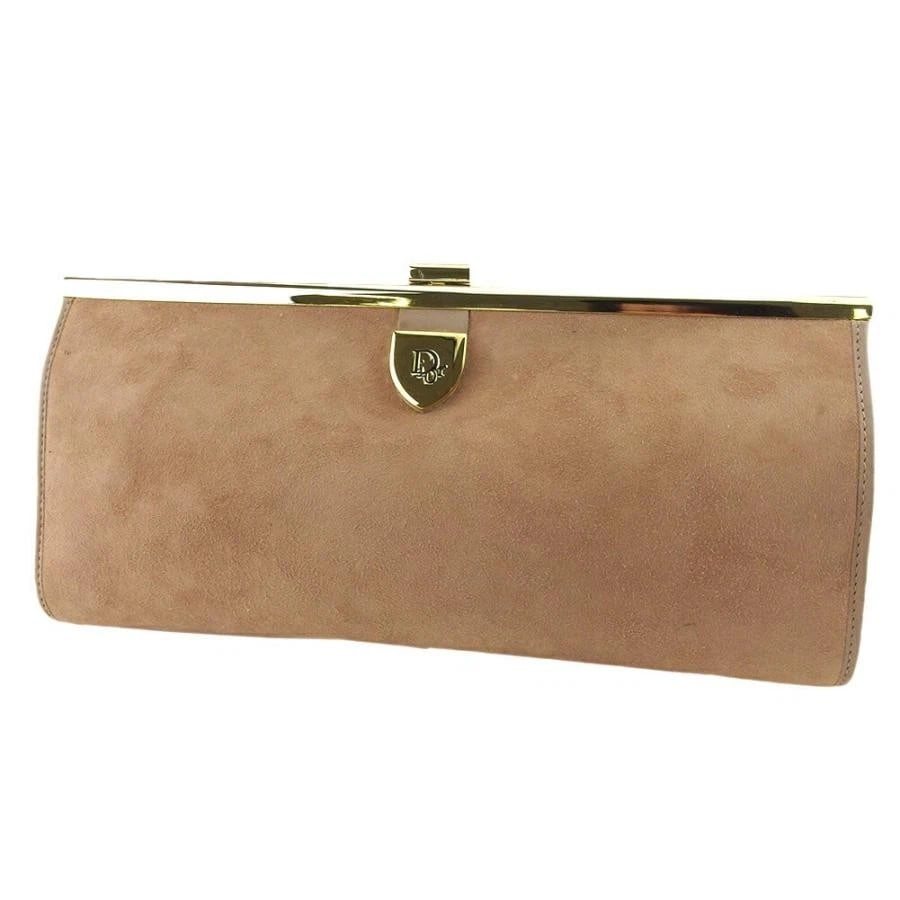 DIOR CLUTCH BAG LOGO ELEGANT: Dior Clutch Bag Logo Elegant Brand: Dior Type/Style: Bag Material: Exterior Material Leather / Canvas Color: Beige, Gold Size: Approx. 27.5 cm (10.8 in) Width, 13 cm (5.1 in) Height, 3 cm (1.2 in)