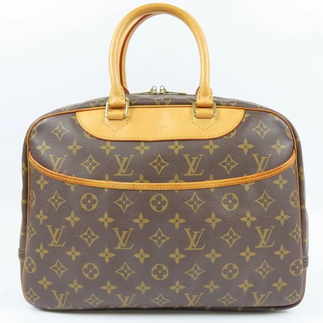 LOUIS VUITTON DEAUVILLE MONOGRAM HANDBAG PVC: Louis Vuitton Deauville Monogram Handbag PVC Brand: LOUIS VUITTON Type/Style: Bag Material: PVC with leather accents Color: Brown Size: Approximately 25 cm (9.8 in) height, 34 cm (13.4 in) width, 14 c