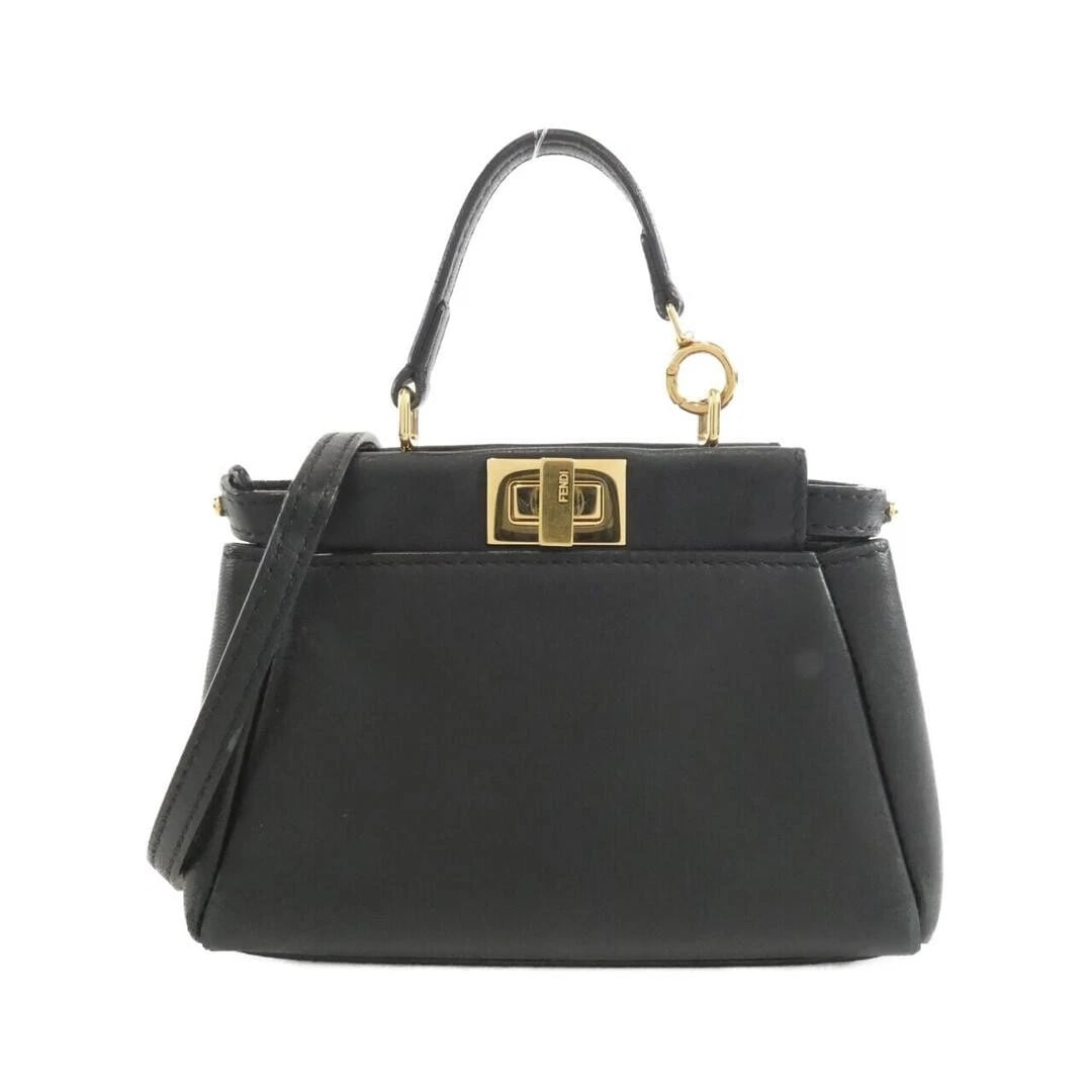 FENDI MICRO PEEKABOO BAG LEATHER: Fendi Micro Peekaboo Bag Leather Brand: FENDI Type/Style: Bag Material: Lamb Leather Color: Nero (Black) with Gold hardware Size: 15 cm (5.9 in) width x 10 cm (3.9 in) height x 5 cm (2 in) depth A