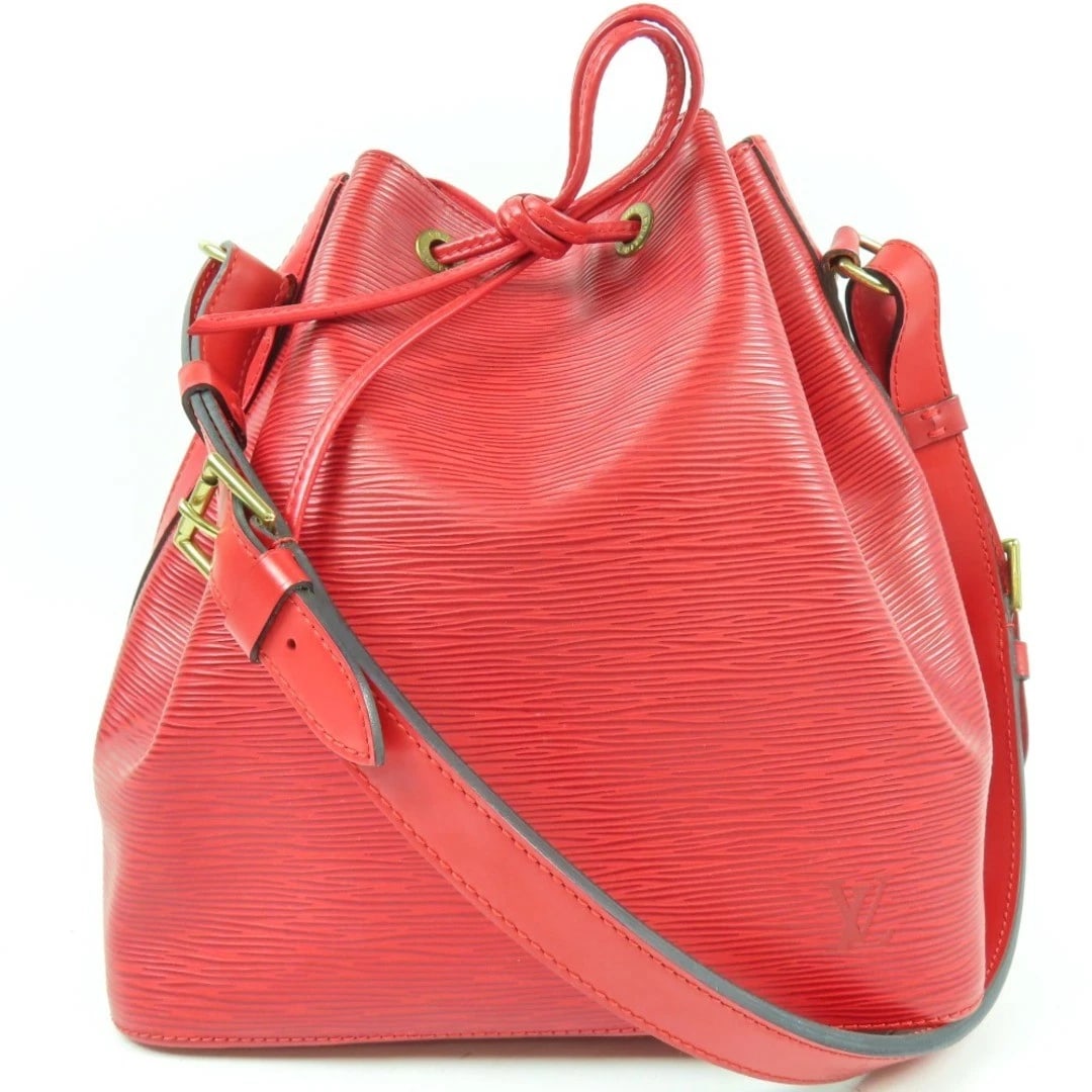LOUIS VUITTON PETIT NOE DRAWSTRING SHOULDER BAG: Louis Vuitton Petit Noe Drawstring Shoulder Bag Brand: LOUIS VUITTON Type/Style: Bag Material: Leather Color: Red Size: 27 cm (10.6 in) (H) x 25.5 cm (10.0 in) (W) x 19 cm (7.5 in) (D) Accessories