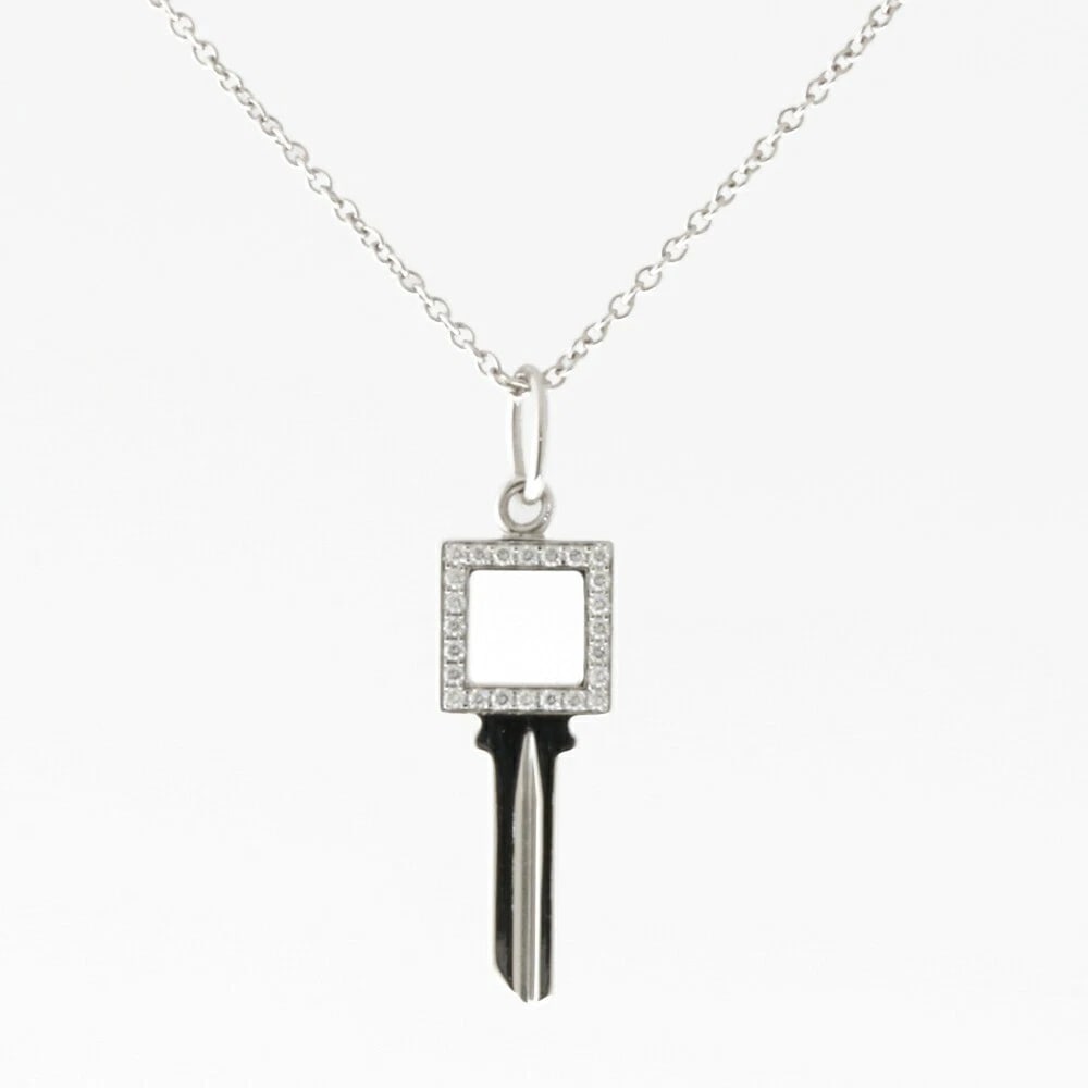 TIFFANY & CO. MODERN KEY DIAMOND NECKLACE: Tiffany & Co. Modern Key Diamond Necklace Brand: Tiffany & Co. Type/Style: Necklace Material: 18K White Gold Color: WG Size: Size: Length approx. 40.5 cm (15.94 in) / Chain width approx. 1.0 mm /