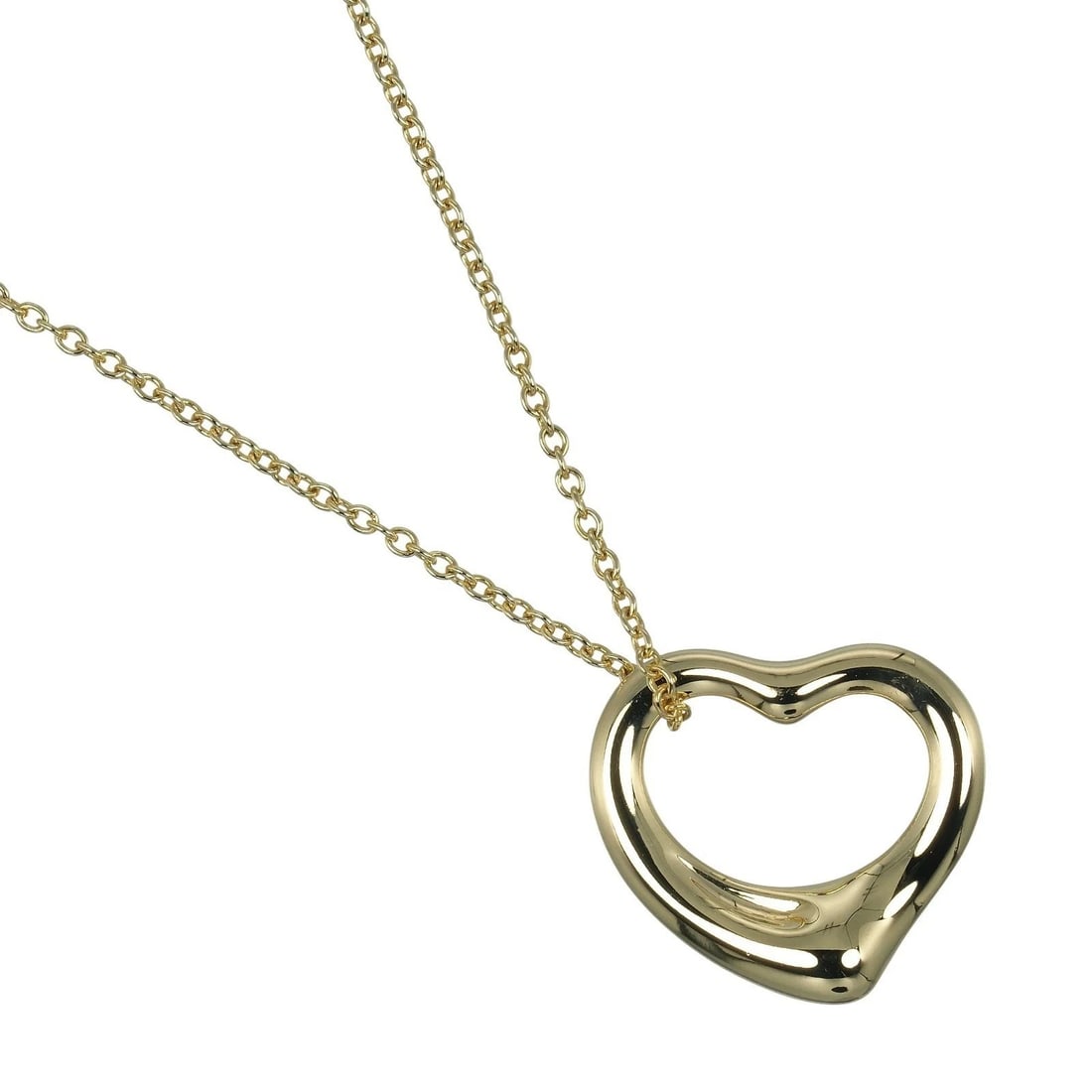 TIFFANY & CO. OPEN HEART NECKLACE: Tiffany & Co. Open Heart Necklace Brand: Tiffany & Co. Type/Style: Necklace Material: 18K Yellow Gold Color: YG Size: Necklace Length: 15.75 inches (40 cm) Pendant Size: 0.80 in (W) ? 0.50 in (H)