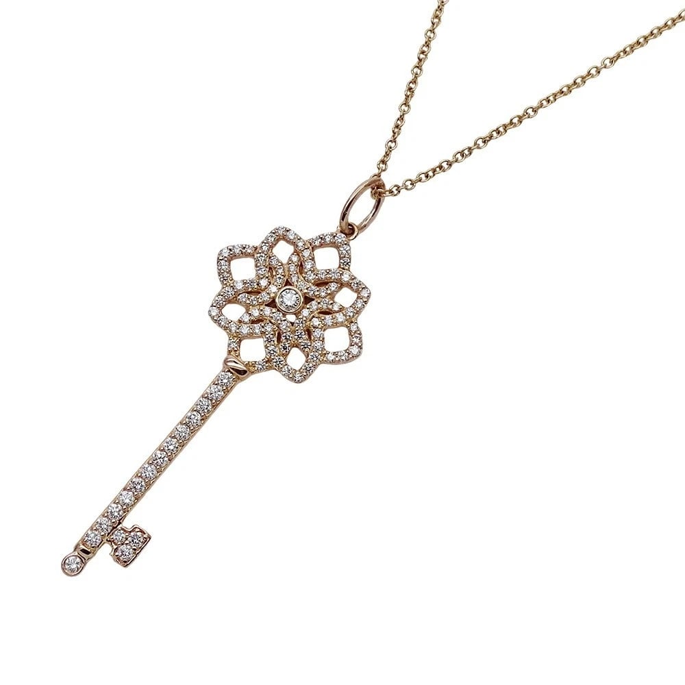TIFFANY & CO DIAMOND WOVEN KEY PENDANT NECKLACE: Tiffany & Co Diamond Woven Key Pendant Necklace Brand: Tiffany & Co. Type/Style: Necklace Material: 18K Pink Gold Color: PG Size: Pendant Size: Approx. 1.48 x 0.60 in (37.5 x 15.3 mm) Necklace Length: