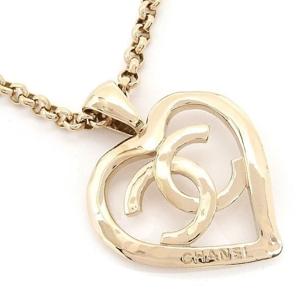 CHANEL COCO MARK HEART LONG NECKLACE: Chanel Coco Mark Heart Long Necklace Brand: CHANEL Type/Style: Necklace Material: Gold Plated Color: None Size: Size: Necklace Length: Approx. 79 cm (31.1 in) Pendant Size: Approx. 1.69 in (W) ? 2.24