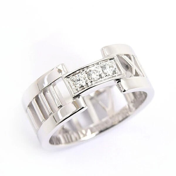 TIFFANY & CO OPEN ATLAS RING: Tiffany & Co Open Atlas Ring Brand: Tiffany & Co. Type/Style: Ring Material: K18WG Color: WG Size: US6 Accessories: None Accessories Notice: When purchasing pre-owned goods, please refer to the