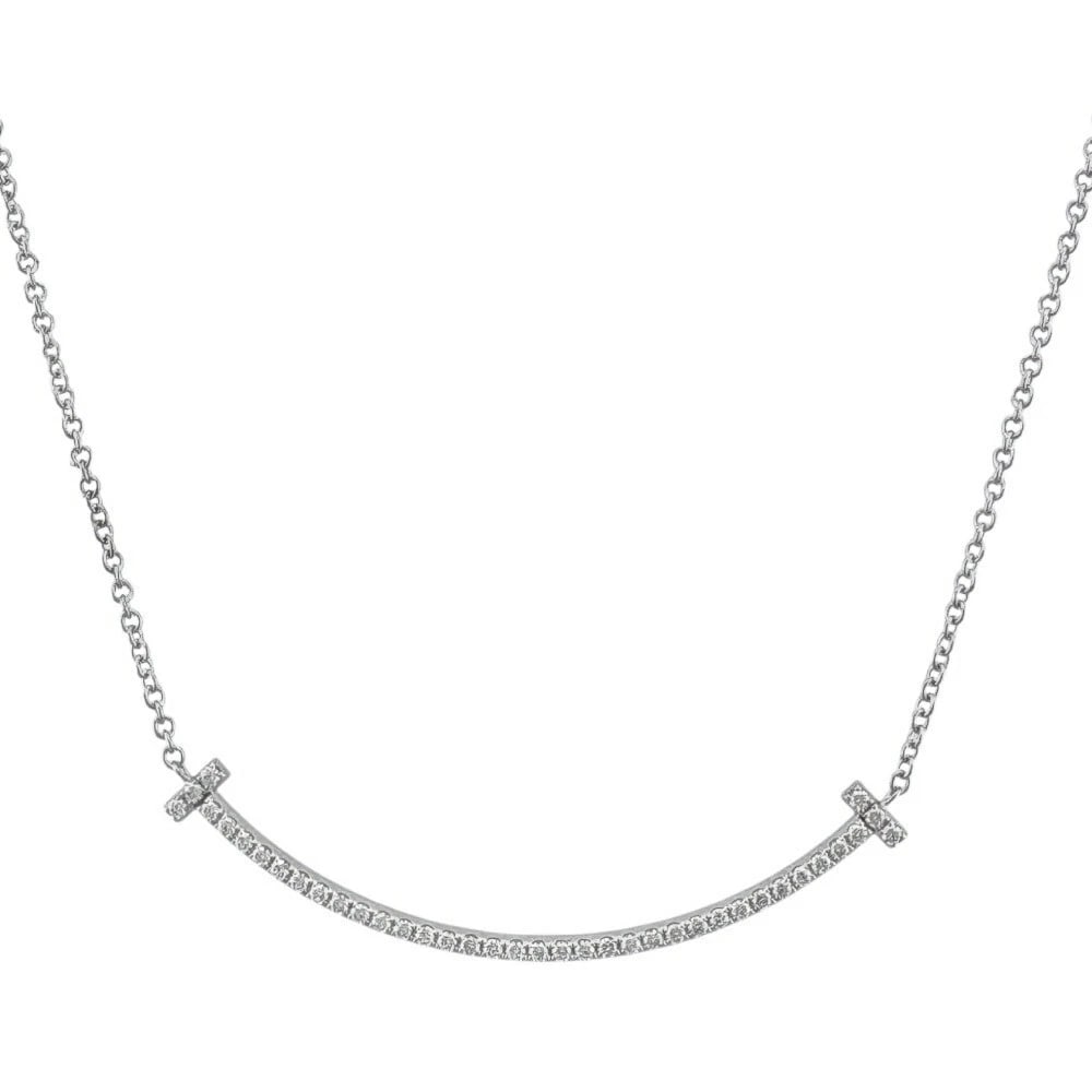TIFFANY & CO. T SMILE DIAMOND NECKLACE: Tiffany & Co. T Smile Diamond Necklace Brand: Tiffany & Co. Type/Style: Necklace Material: 18K White Gold Color: WG Size: Size: Necklace Length Approx. 15.94 inches (40.5cm, including pendant); Pendan