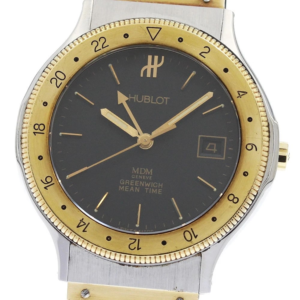 HUBLOT MDM CLASSIC GMT QUARTZ WATCH: HUBLOT MDM Classic GMT Quartz Watch Brand: HUBLOT Type/Style: Wristwatch Material: Band Material rubber, Case Material Stainless Steel/YG Color: Band Color black, Case Color Silver / Gold, Dial Color