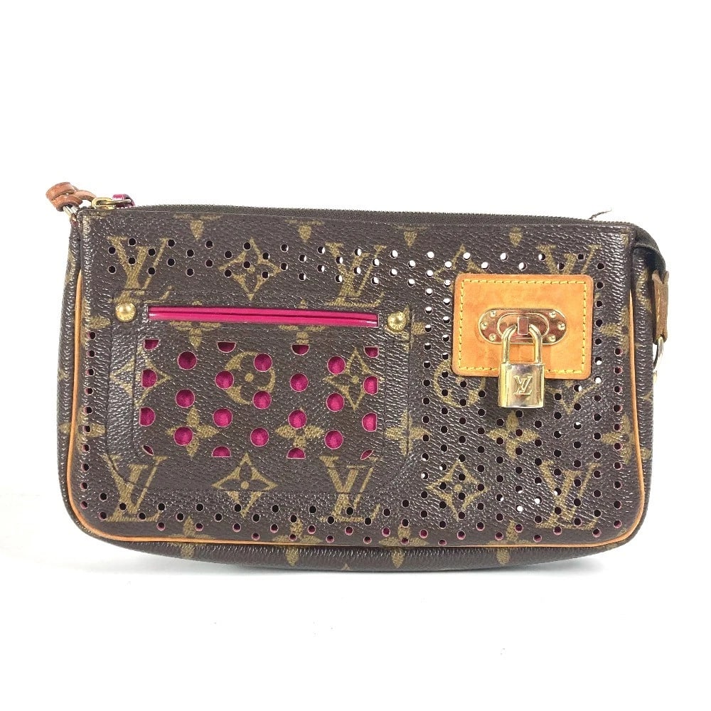 LOUIS VUITTON MONOGRAM PERFO POCHETTE ACCESSORY POUCH SHOULDER BAG: LOUIS VUITTON Monogram Perfo Pochette Accessory pouch Shoulder Bag Brand: LOUIS VUITTON Type/Style: Shoulder Bag Material: MonogramCanvas Color: Fuchsia / pink Size: W8.3?H4.7?D1.4inch / W21cm?H12cm?D