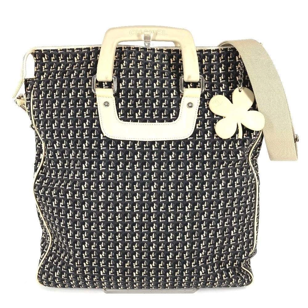 CHANEL CLOVER LOGO 2-WAY BAG HANDBAG VERTICAL: CHANEL Clover logo 2-way bag Handbag Vertical Brand: CHANEL Type/Style: Shoulder Bag Material: Leather/Canvas Color: Black/Beige Size: W13.6?H15.0?D3.1inch / W34.5cm?H38cm?D8cm Accessories: None <