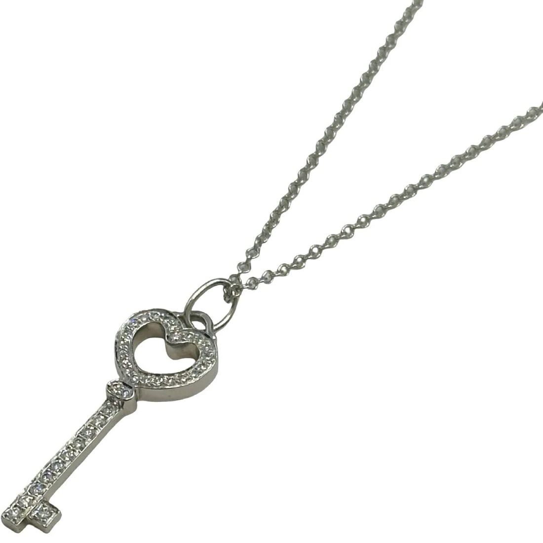 TIFFANY & CO. HEART KEY NECKLACE PLATINUM PT950: Tiffany & Co. Heart Key Necklace Platinum Pt950 Brand: Tiffany & Co. Type/Style: Necklace Material: Pt950, Main Stone/Creation Natural Color: Platinum Size: Height: approx. 24.7mm Width: approx. 8.6mm