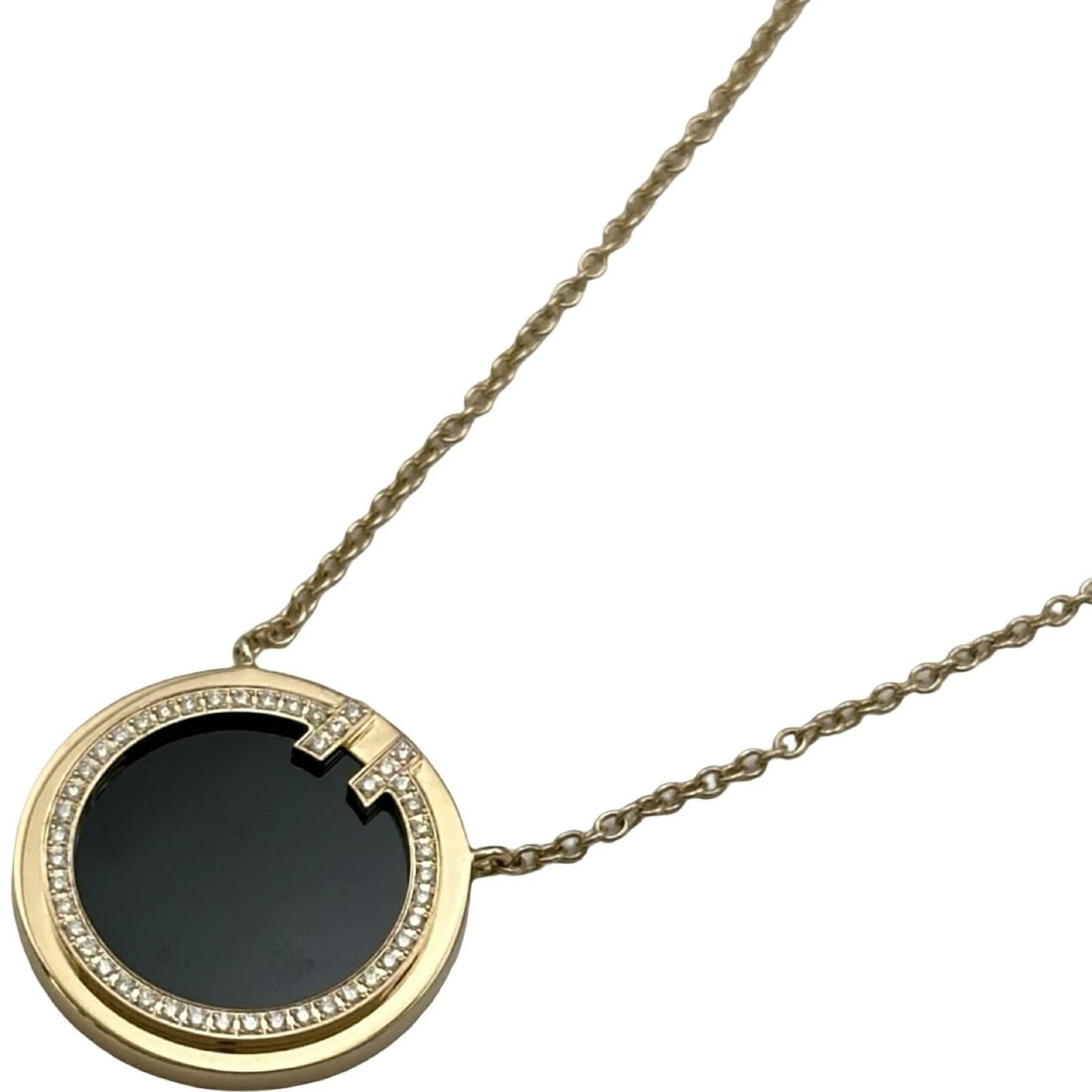 TIFFANY & CO. DIAMOND NECKLACE PINK GOLD 18K ONYX: Tiffany & Co. Diamond Necklace Pink Gold 18K Onyx Brand: Tiffany & Co. Type/Style: Necklace Material: Au750, Main Stone/Creation Onyx Secondary Stone Diamnd Color: Pink Gold Size: Height: approx.
