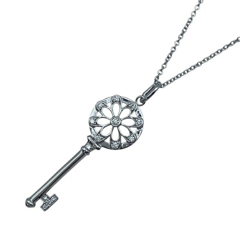 TIFFANY & CO. FLORAL KEY NECKLACE WHITE GOLD AU750: Tiffany & Co. Floral Key Necklace White Gold Au750 Brand: Tiffany & Co. Type/Style: Necklace Material: Au750, Color: White Gold Size: Height: approx. 32.4mmChain length: approx. 40cmRing inner