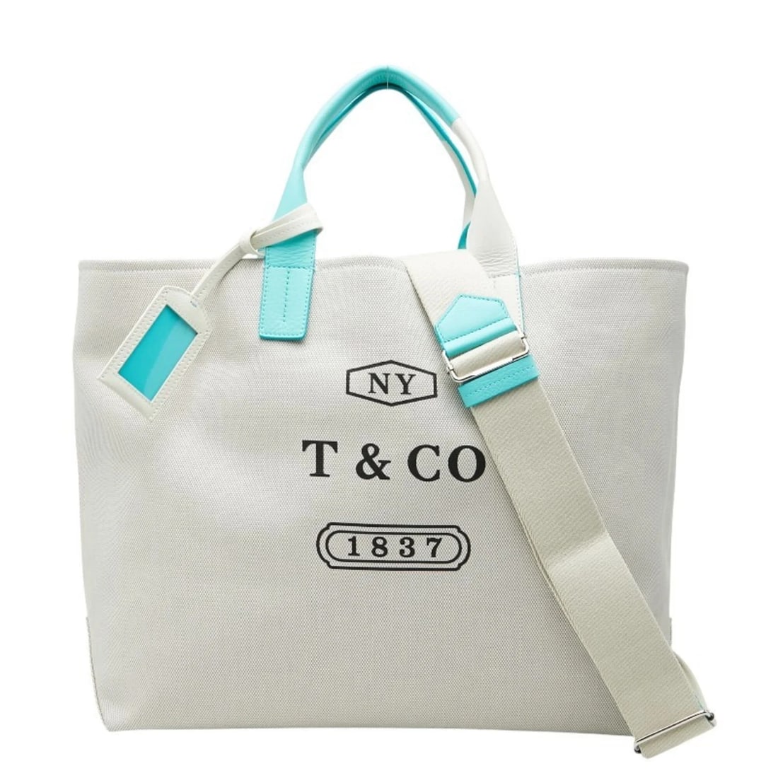 TIFFANY WEEKEND TOTE BAG/SHOULDER BAG (2-WAY) - IVORY/BLUE CANVAS: Tiffany Weekend Tote Bag/Shoulder Bag (2-Way) - Ivory/Blue Canvas Brand: Tiffany Type/Style: Shoulder bag, Tote bag Material: Canvas,Leather Color: Blue, Ivory Size: (HxWxD)33.5cm x 51cm x 15cm / 13.1