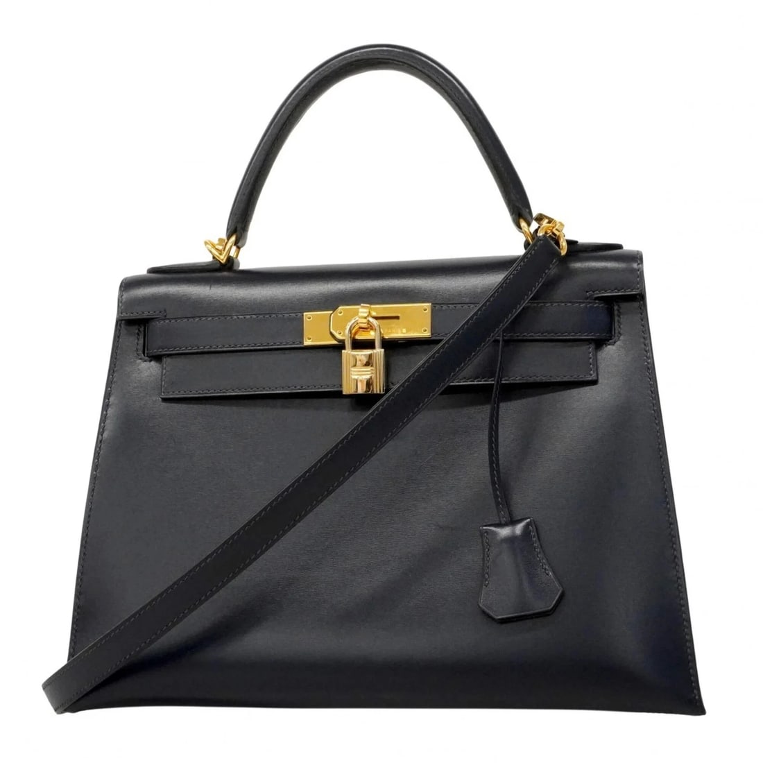 HERMES KELLY 28 HANDBAG, BOX CALF LEATHER, BLUE INDIGO: Hermes Kelly 28 Handbag, Box Calf Leather, Blue Indigo Brand: Hermes Type/Style: Handbag Material: Box calf leather Color: Blue indigo Size: (HxWxD)21cm x 29cm x 12cm / 8.26'' x 11.41'' x 4.72''