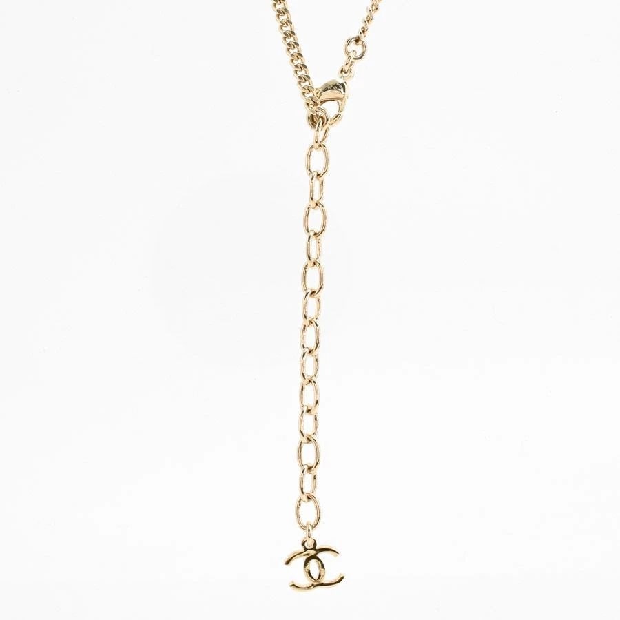 CHANEL NECKLACE GOLD PLATED PINK RHINESTONES BAG MOTIF: Chanel Necklace Gold Plated Pink Rhinestones Bag Motif Brand: CHANEL Type/Style: Necklace Material: Gold Plated, Color: white Size: Chain Length (including clasp): Approx. 59/66.5cm / Charm: Approx. W