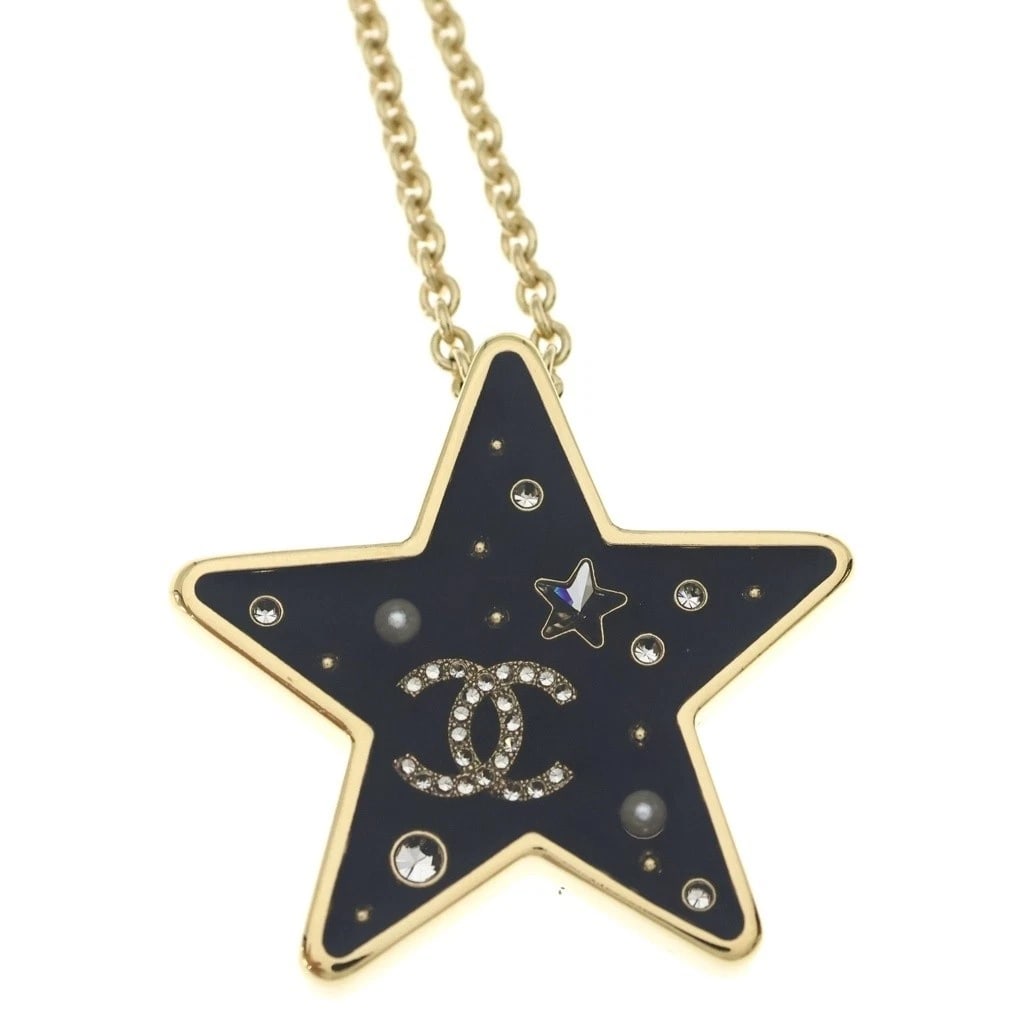 CHANEL NECKLACE STAR MOTIF COCO MARK RHINESTONE GOLD PLATED: CHANEL Necklace Star Motif Coco Mark Rhinestone Gold Plated Brand: CHANEL Type/Style: Necklace Material: Rhinestone, Color: Gold Size: Actual Measurements: ?Top? Diameter: 42.47 mm ?Chain? Total Lengt