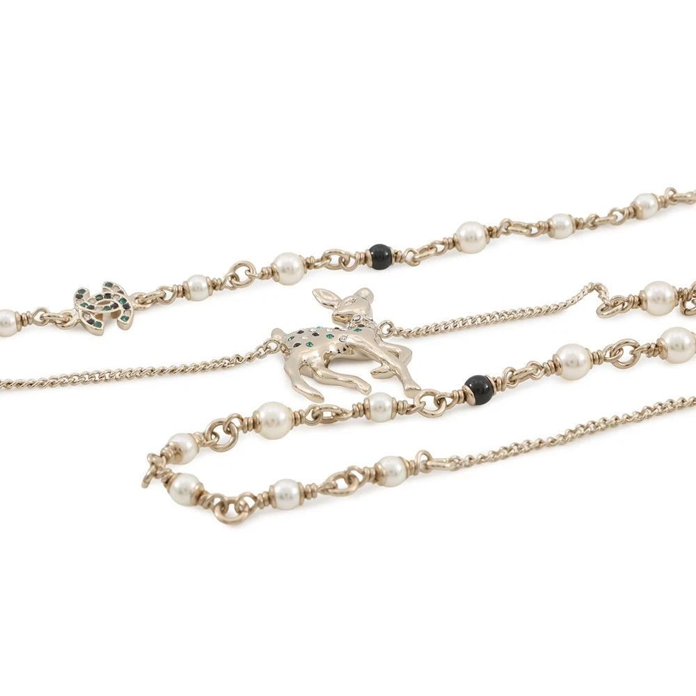 CHANEL NECKLACE COCO MARK BAMBI MOTIF LONG PEARLS/RHINESTONES: Chanel Necklace Coco Mark Bambi Motif Long Pearls/Rhinestones Brand: Chanel Type/Style: Necklace Material: Metal/Faux pearl/Rhinestone, Color: Champagne gold Size: Chain length/62cm 70.5cm (2-step adj