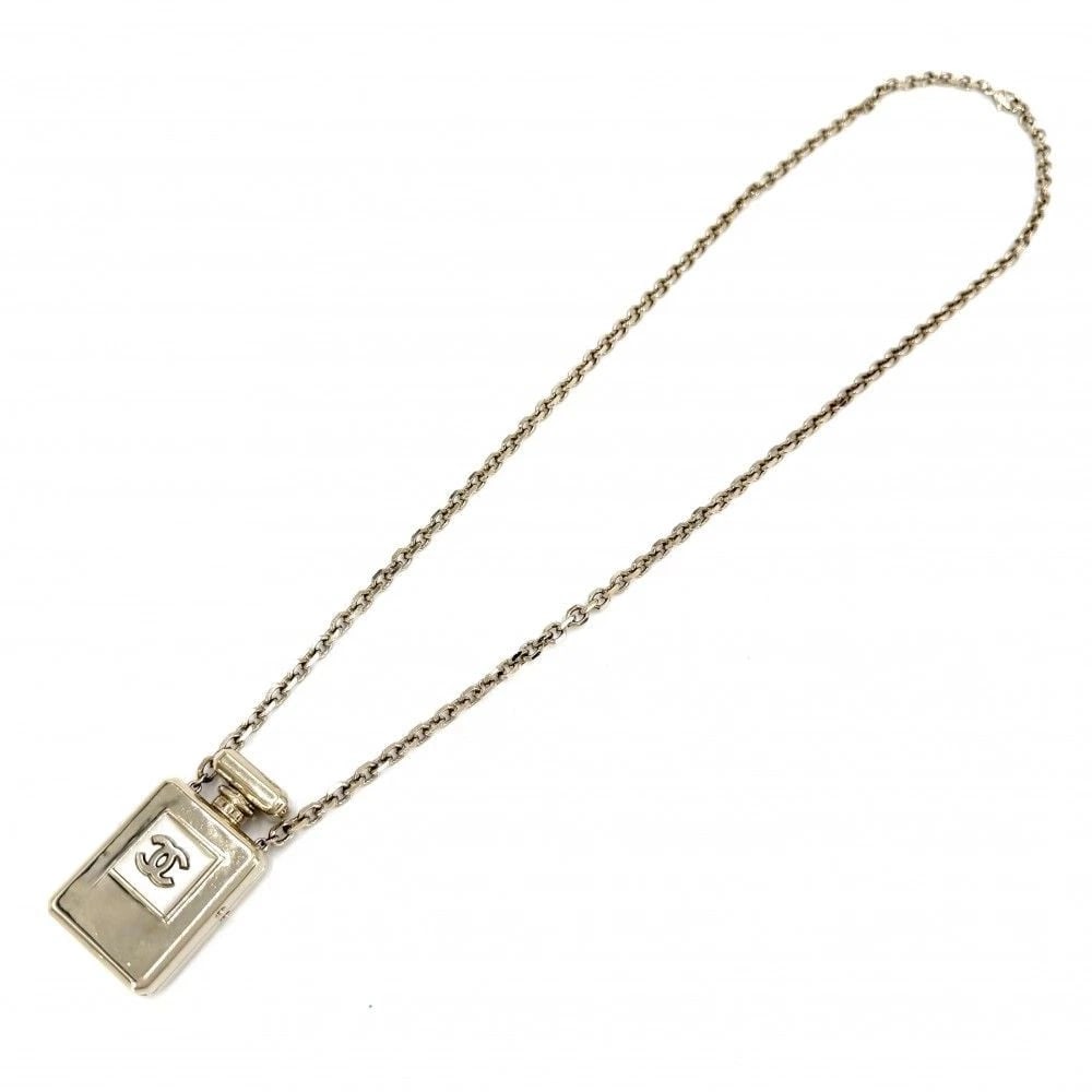 CHANEL NECKLACE PERFUME MOTIF COCO MARK LONG GP: Chanel Necklace Perfume Motif Coco Mark Long GP Brand: Chanel Type/Style: Necklace Material: GP, Color: GOLD Size: Total Length:Approx. 82cm Chain Width: Approx. 0.5cm ?Top? Height: Approx. 5.2cm Widt