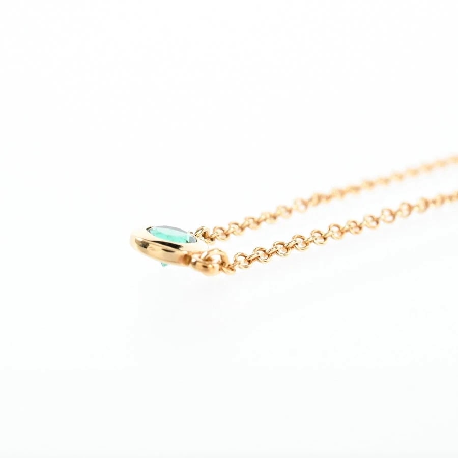 TIFFANY & CO. BY THE YARD NECKLACE PENDANT CHARM 18K YELLOW GOLD: Tiffany & Co. By the Yard Necklace Pendant Charm 18K Yellow Gold Brand: Tiffany & Co. Type/Style: Pendant Material: 18K Yellow Gold, Main Stone/Creation Emerald Color: Yellow Gold Size: Chain Length (