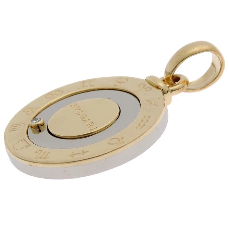 BVLGARI HOROSCOPE DIAMOND PENDANT TOP 750 YELLOW GOLD CHARM PENDANT: BVLGARI Horoscope Diamond Pendant Top 750 Yellow Gold Charm Pendant Brand: Bvlgari Type/Style: Pendant Material: 750 Yellow Gold,Sterling silver, Color: YG,Silver Size: Top W approx. 22.9mm x H approx