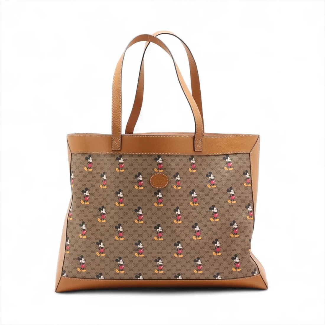 GUCCI X DISNEY MINI GG SUPREME PVC & LEATHER TOTE BAG: Gucci x Disney Mini GG Supreme PVC & leather Tote bag Brand: Gucci x Disney Type/Style: Tote bag Material: PVC & leather Color: Brown Size: Height:12.8inchLength:17.3inchDepth:5.7inch Accessories:
