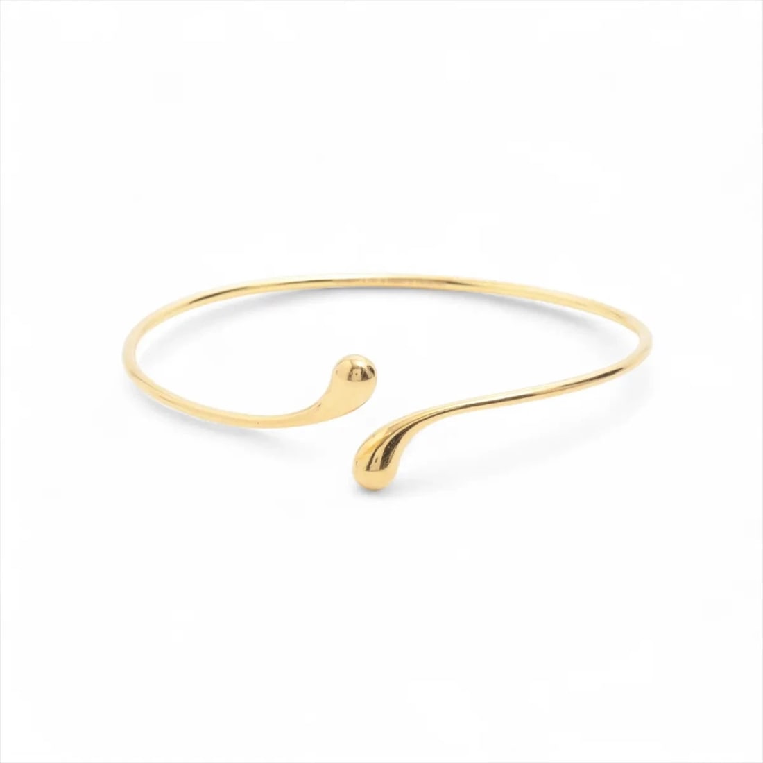 TIFFANY TEARDROP BANGLE 750(YG): Tiffany Teardrop Bangle 750(YG) Brand: Tiffany Type/Style: Bracelet Material: 750(YG), Color: YG Size: (CM) Bracelet length:19.1 (Inch) Bracelet Length:7.5inch Accessories: None Accessories Notice:
