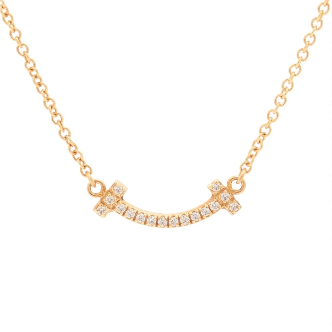 TIFFANY T SMILE MINI DIAMOND NECKLACE 750(YG): Tiffany T Smile Mini diamond Necklace 750(YG) Brand: Tiffany Type/Style: Necklace Material: 750(YG), Main Stone/Creation Natural Color: YG Size: (CM) Chain length:46.3 (Inch) Chain Length:18.2inch