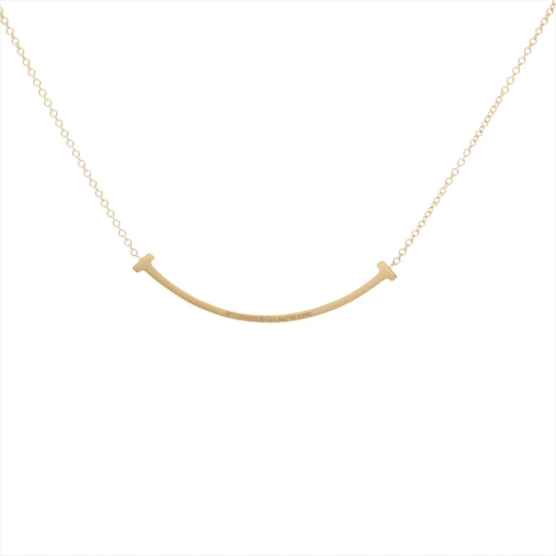 TIFFANY T SMILE SMALL DIAMOND NECKLACE 750(YG): Tiffany T Smile Small diamond Necklace 750(YG) Brand: Tiffany Type/Style: Necklace Material: 750(YG), Main Stone/Creation Natural Color: YG Size: (CM) Chain length:45.5 (Inch) Chain Length:17.9inch