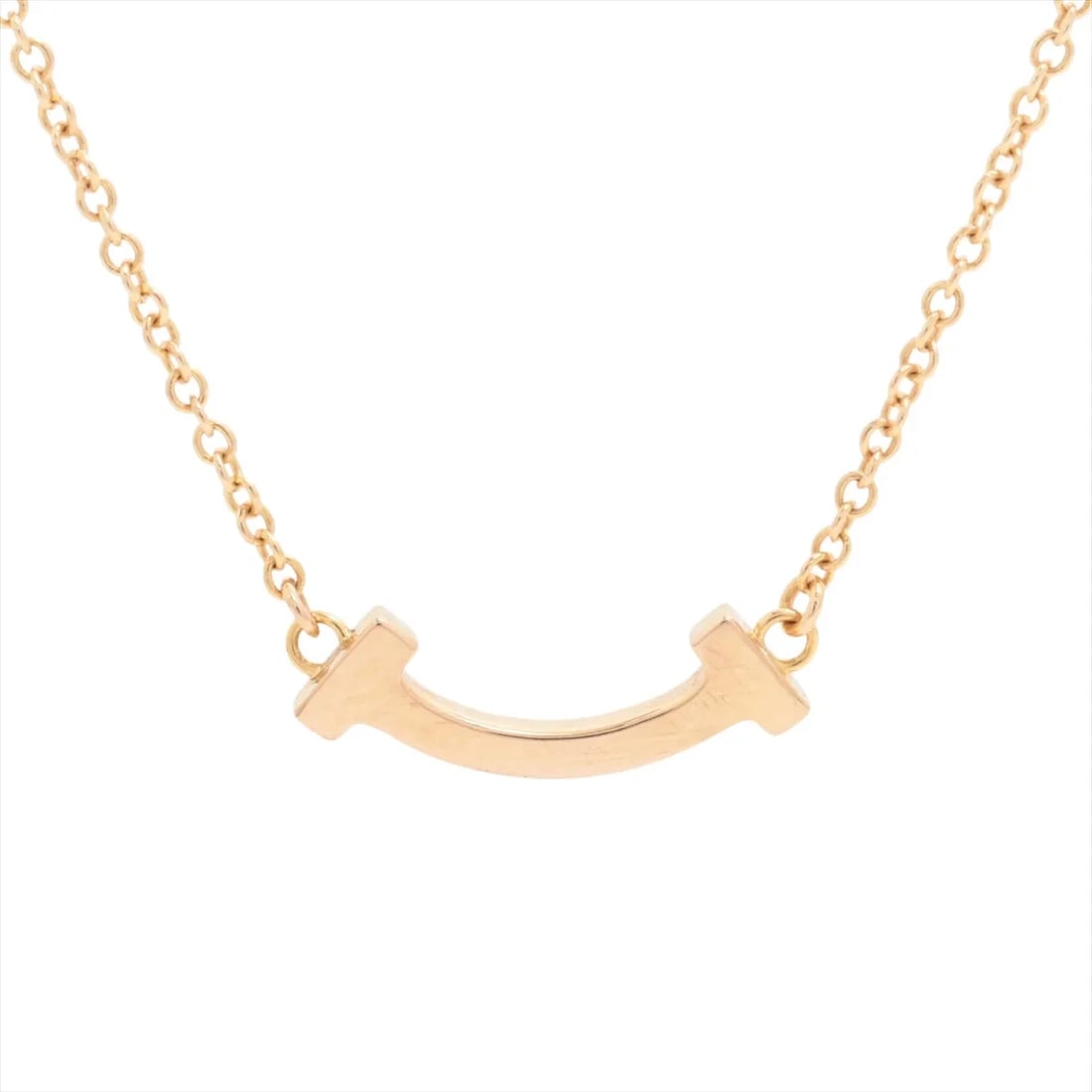 TIFFANY T SMILE MINI NECKLACE 750(PG): Tiffany T Smile Mini Necklace 750(PG) Brand: Tiffany Type/Style: Necklace Material: 750(PG), Main Stone/Creation Natural Color: PG Size: (CM) Chain length:46.1 (Inch) Chain Length:18.1inch Accesso