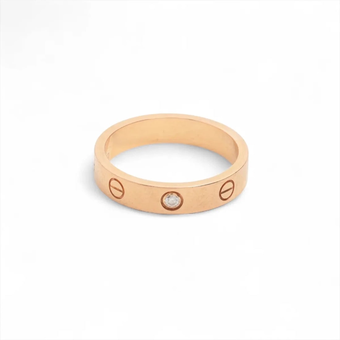 CARTIER MINI LOVE 1P DIAMOND RING 750(PG): Cartier Mini Love 1P diamond Ring 750(PG) Brand: Cartier Type/Style: Ring Material: 750(PG), Main Stone/Creation Natural Color: PG Size: 7 - 7.25 US Accessories: None Accessories Notice: When