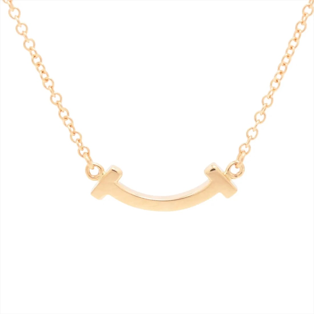 TIFFANY T SMILE MINI NECKLACE 750(PG): Tiffany T Smile Mini Necklace 750(PG) Brand: Tiffany Type/Style: Necklace Material: 750(PG), Color: PG Size: (CM) Chain length:46.3 Accessories: None Accessories Notice: When purchasing pre-owned