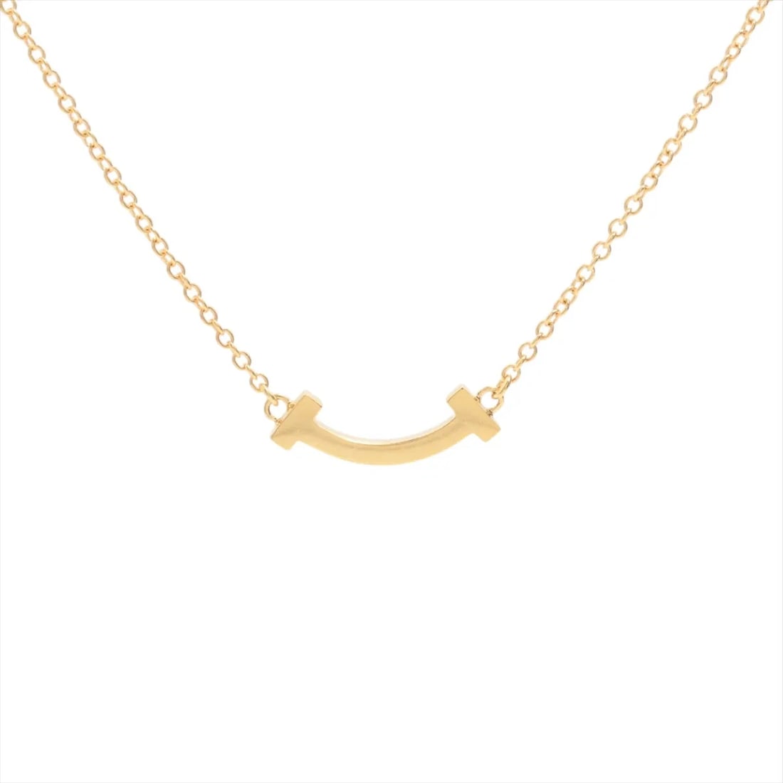 TIFFANY T SMILE MINI NECKLACE 750(YG): Tiffany T Smile Mini Necklace 750(YG) Brand: Tiffany Type/Style: Necklace Material: 750(YG), Color: YG Size: (CM) Chain length:45.9 Accessories: None Accessories Notice: When purchasing pre-owned