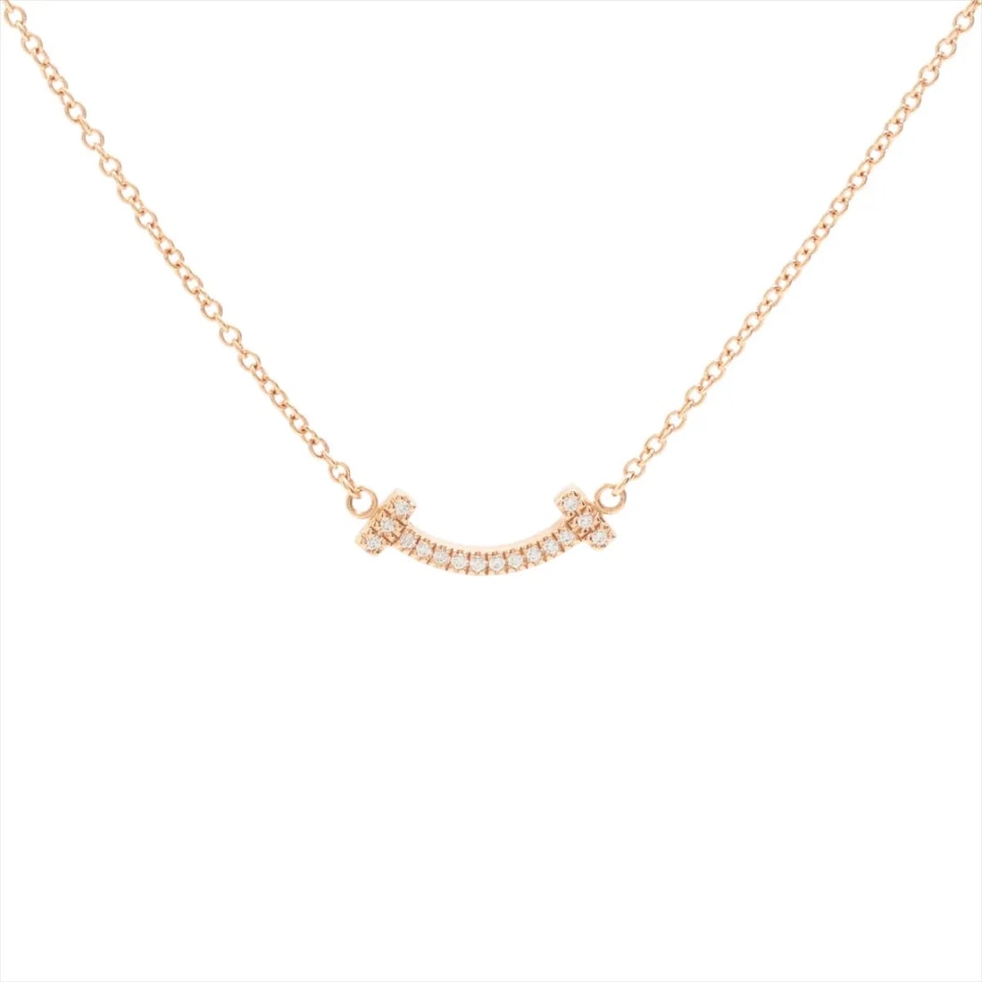 TIFFANY T SMILE MINI DIAMOND NECKLACE 750(PG): Tiffany T Smile Mini diamond Necklace 750(PG) Brand: Tiffany Type/Style: Necklace Material: 750(PG), Main Stone/Creation Natural Color: PG Size: (CM) Chain length:45.9 Accessories: None Accessories