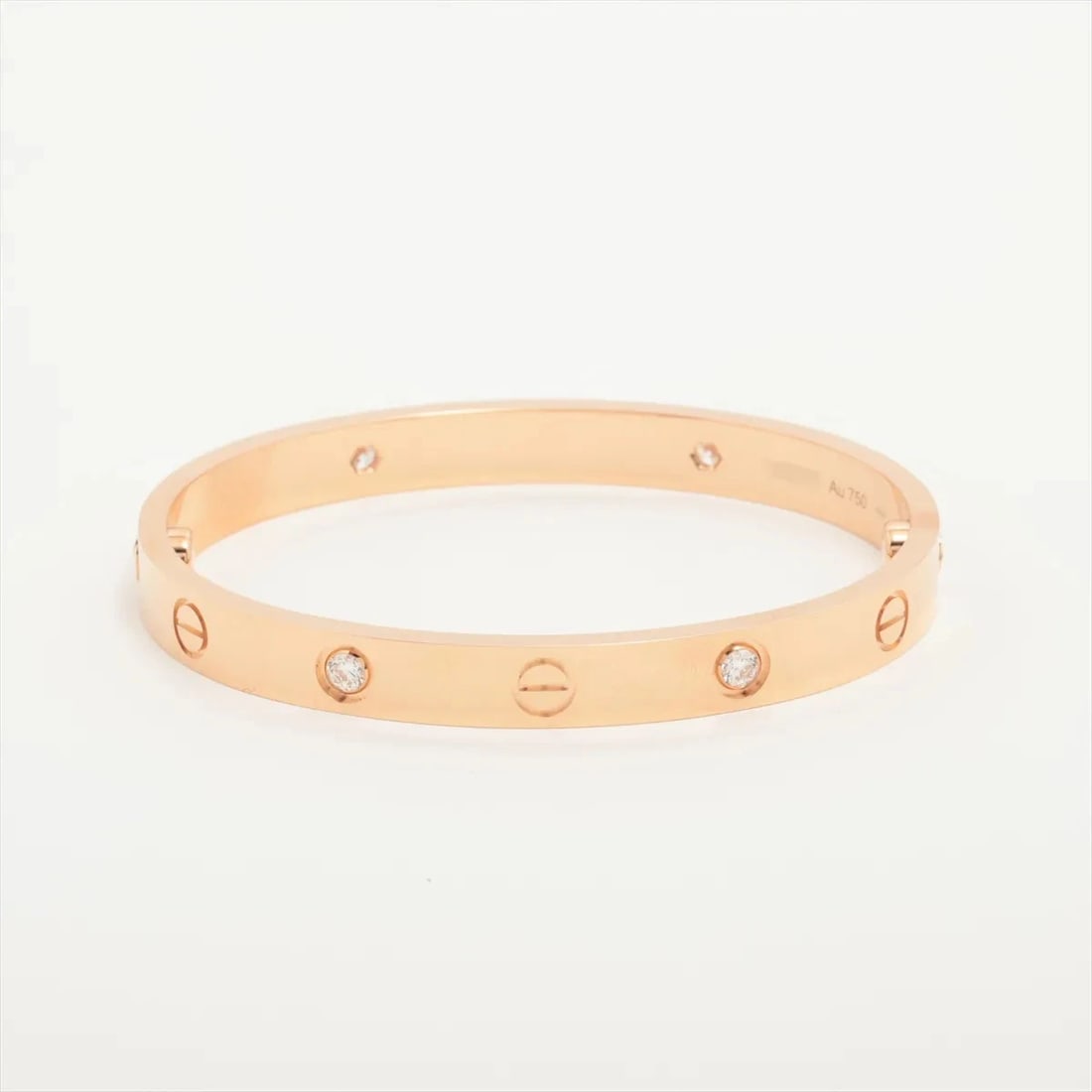 CARTIER LOVE HALF DIAMOND BRACELET 750(PG): Cartier Love half diamond Bracelet 750(PG) Brand: Cartier Type/Style: Bracelet Material: 750(PG), Main Stone/Creation Natural Color: PG Size: (CM) Bracelet length:15.2 Accessories: None Accessories