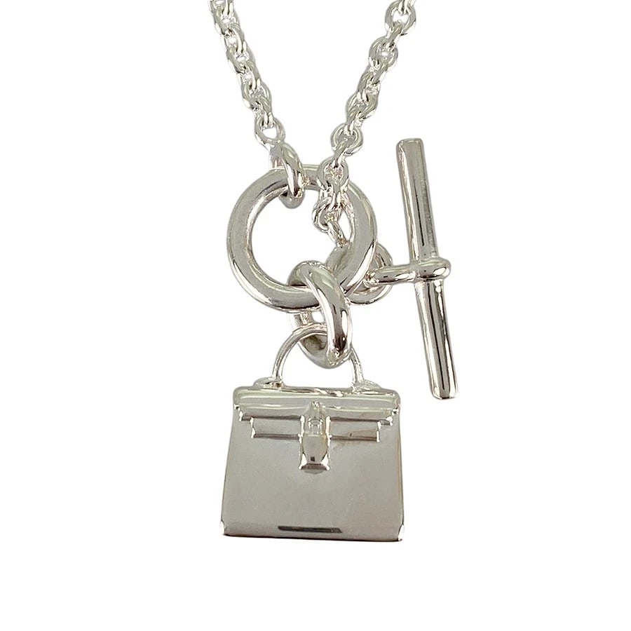 HERMES KELLY AMULET SILVER NECKLACE: HERMES Kelly Amulet Silver Necklace Brand: HERMES Type/Style: Necklace Material: Silver 925, Color: Silver Size: Top size:15.0mm?12.5mm Necklace full length:41cm Accessories: None Accessories Notice: