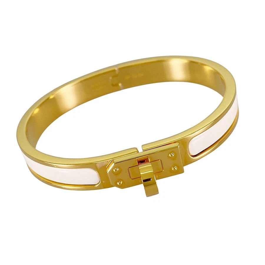 HERMES MINI CLICK KELLY GOLD PLATED BRACELET: HERMES Mini Click Kelly Gold plated Bracelet Brand: HERMES Type/Style: Bracelet Material: Gold Plated, Color: Gold Claims Size: Bracelet width:8.3mm Wrist Size:15.5cm Accessories: None Acc