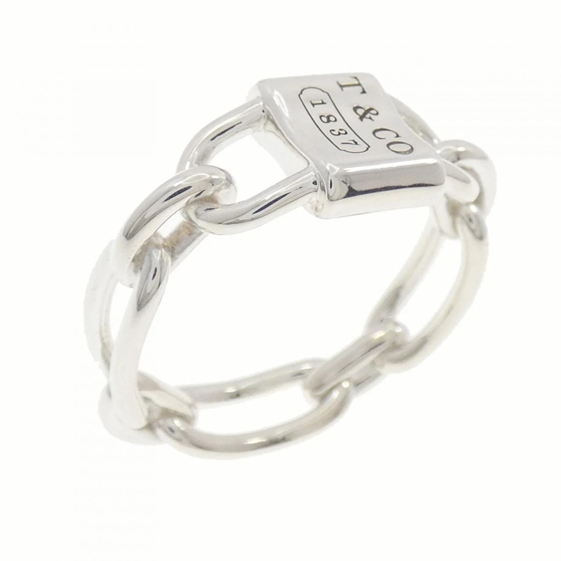 TIFFANY DOUBLE LOCK RING: Tiffany Double Lock Ring Brand: Tiffany & Co. Type/Style: Ring Material: 925 Sterling Silver, Color: Silver Size: US 7 Accessories: None Accessories Notice: When purchasing pre-owned goods, please