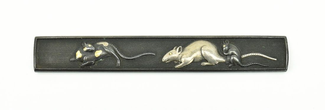 KINKO KODZUKA: Kinko Kodzuka Size: Description: Kinko Kodzuka. Shakudo nanako ground. High relief of three rats with gold, silver and shakudo highlights. Signed: Kumaya Yoshi Yuki. Mid 19th century. Baur, P. 407 (74