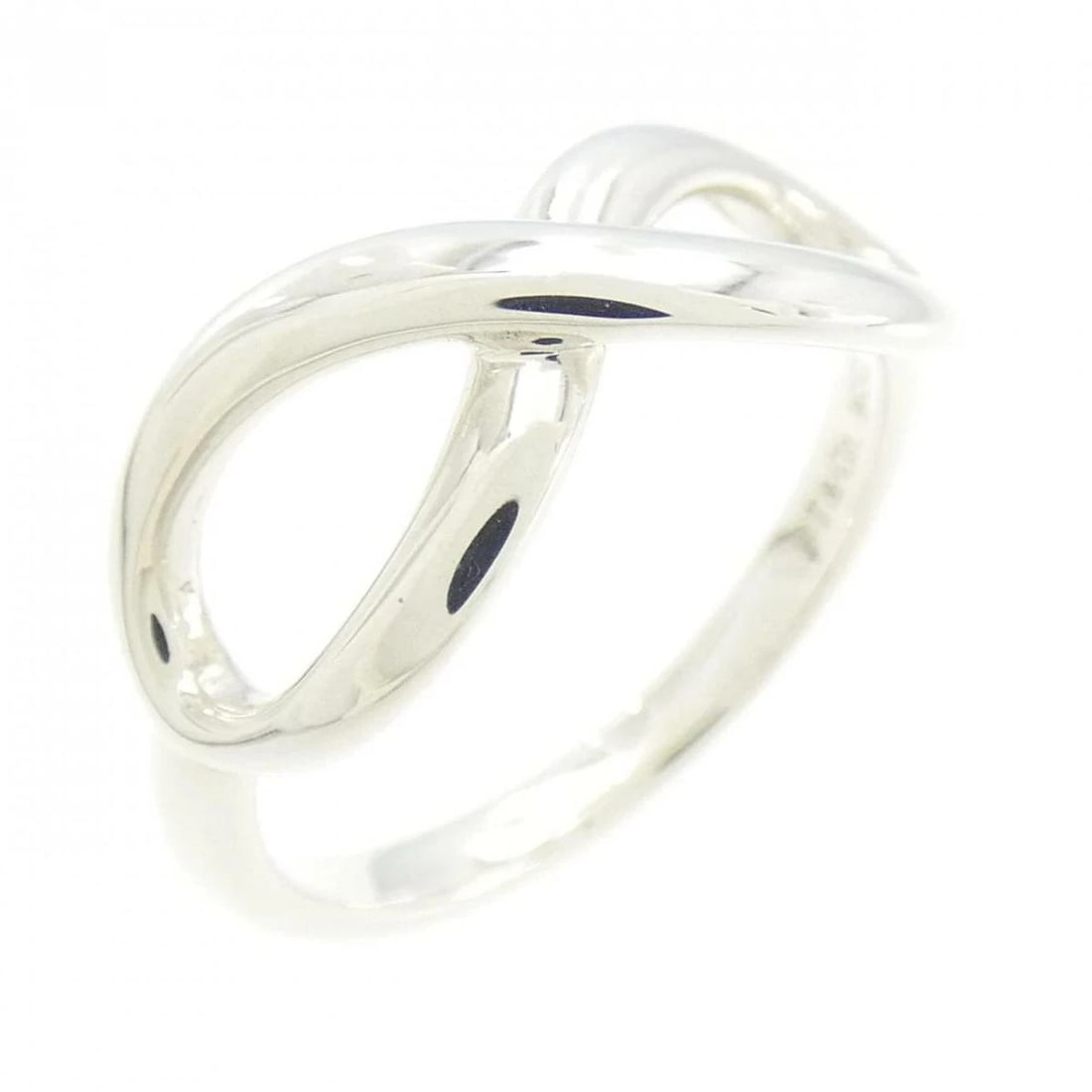 TIFFANY SILVER INFINITY RING: Tiffany Silver Infinity Ring Brand: Tiffany & Co. Type/Style: Ring Material: SV925, Color: Silver Size: US 4.5 Accessories: None Accessories Notice: When purchasing pre-owned goods, please refer to
